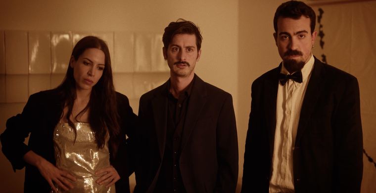 Tres personajes de gala.